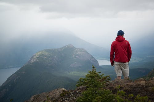 Man Standing on Rock Formation