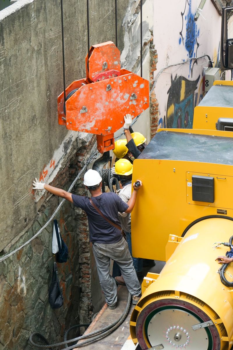 Workers with helmets at construction site
