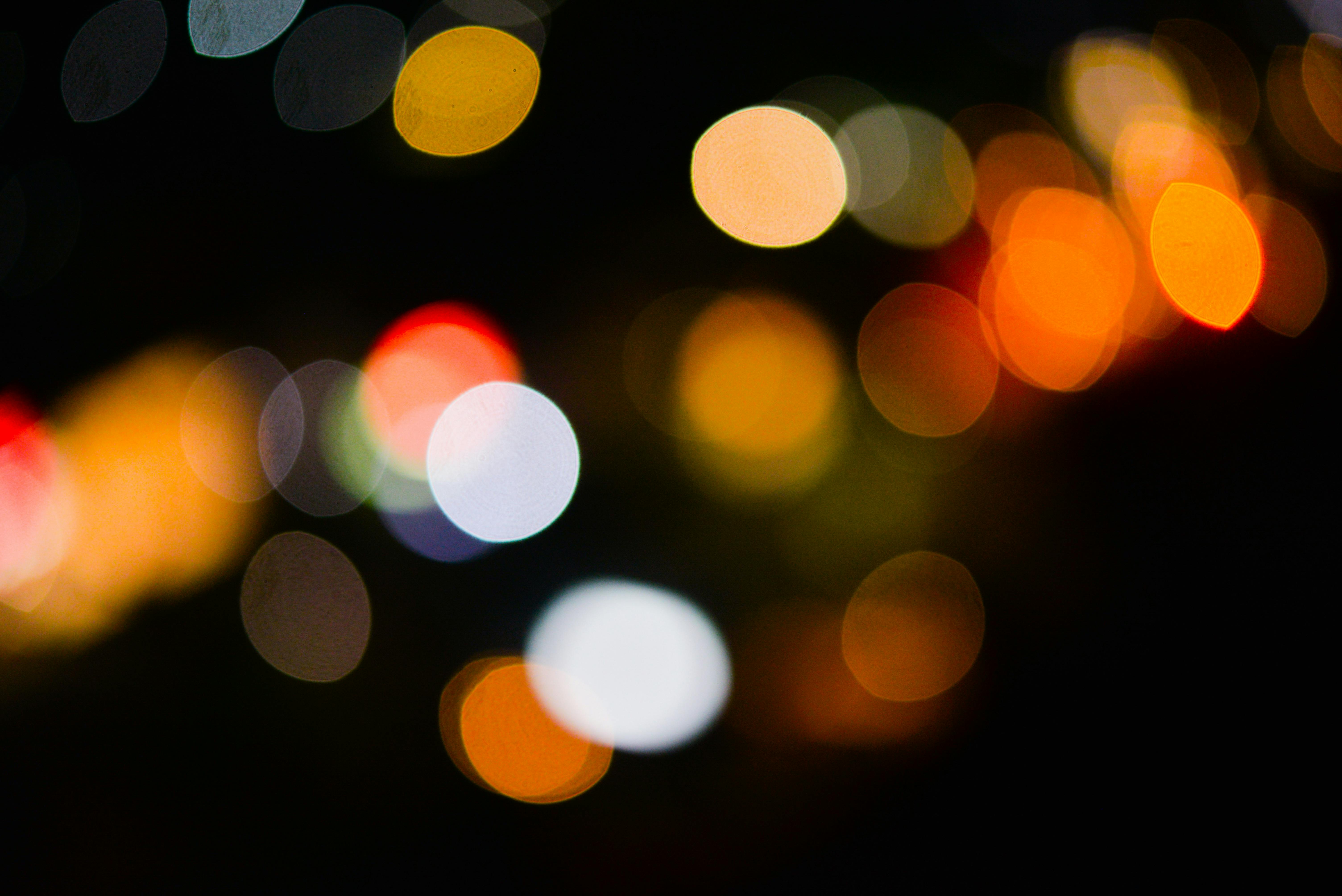 Free stock photo of blurry  background city lights  gold tone