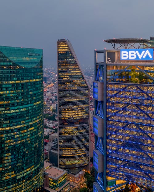 Free Aerial View of Illuminated Skyscrapers in Downtown Mexico City, Mexico  Stock Photo