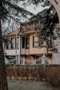 Elegant suburban houses with rustic charm and a serene landscape.