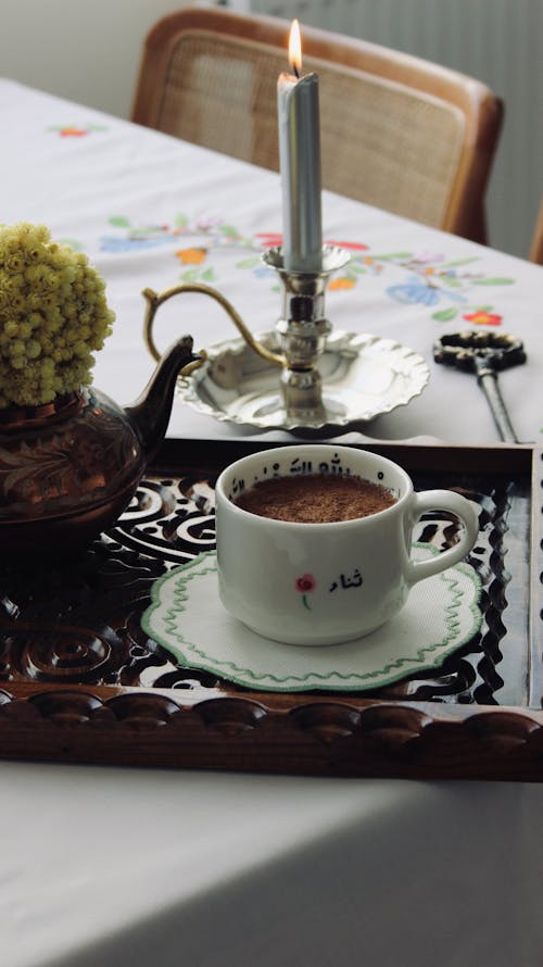 Cup of Coffee and Pot on Tray