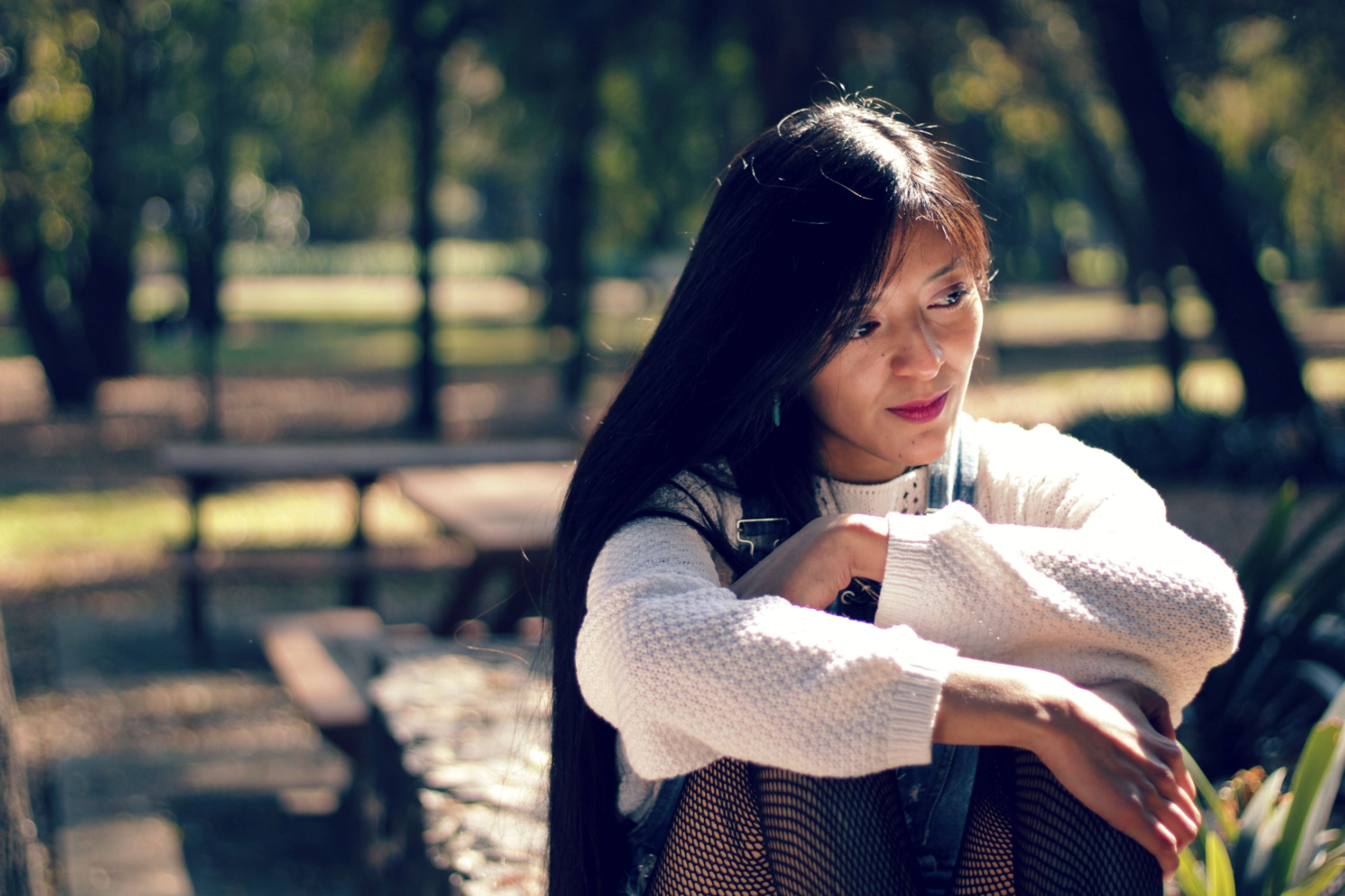 A Woman in White Knitted Sweater · Free Stock Photo