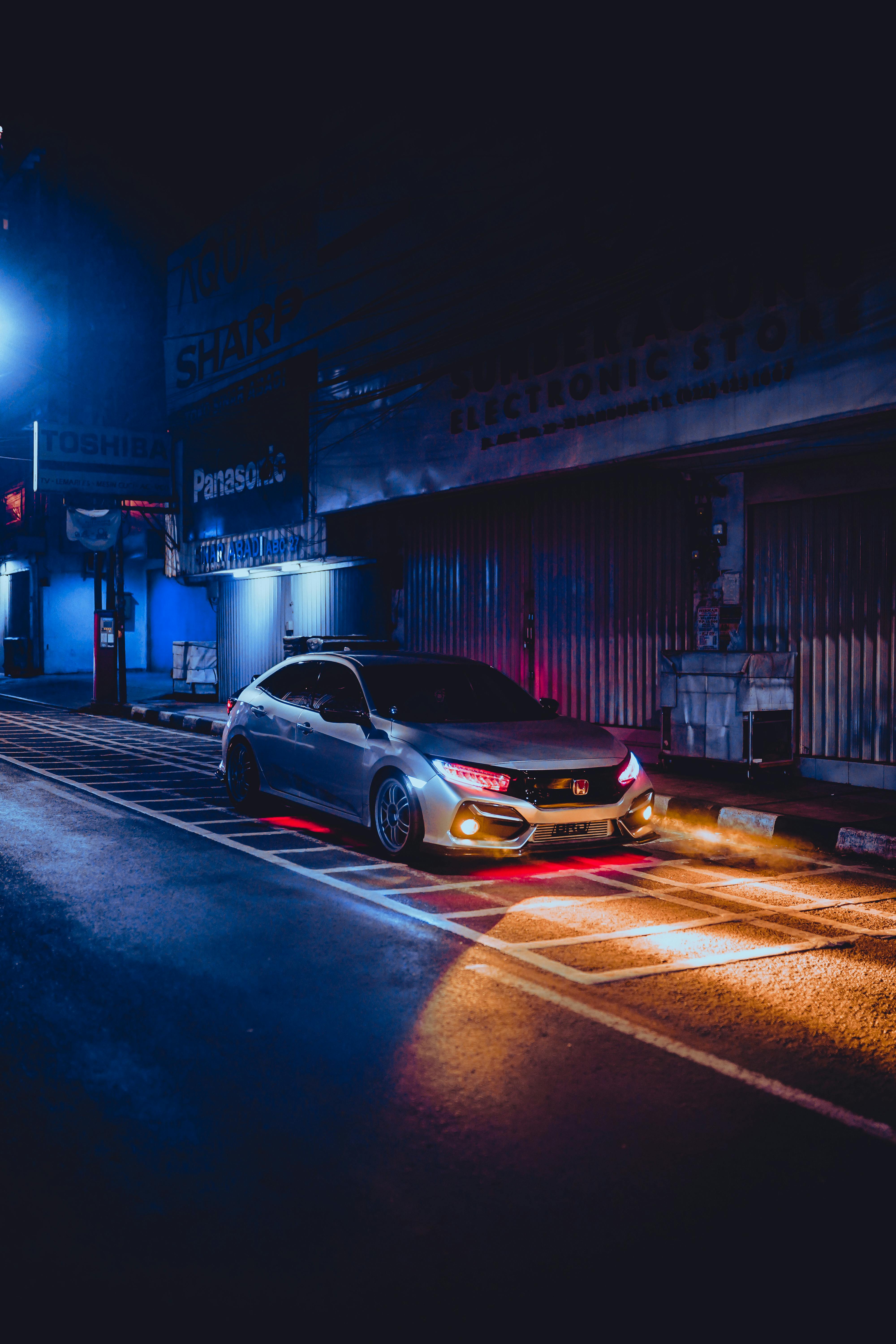 honda car on street at night