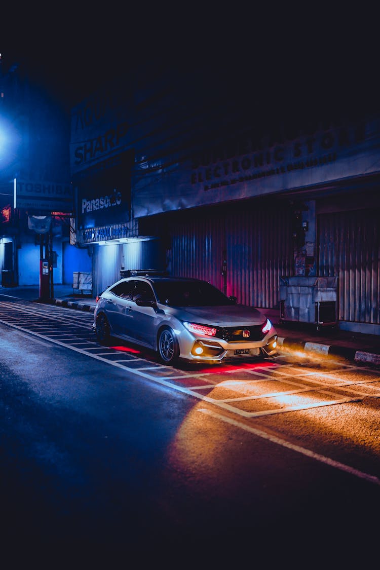 Honda Car On Street At Night