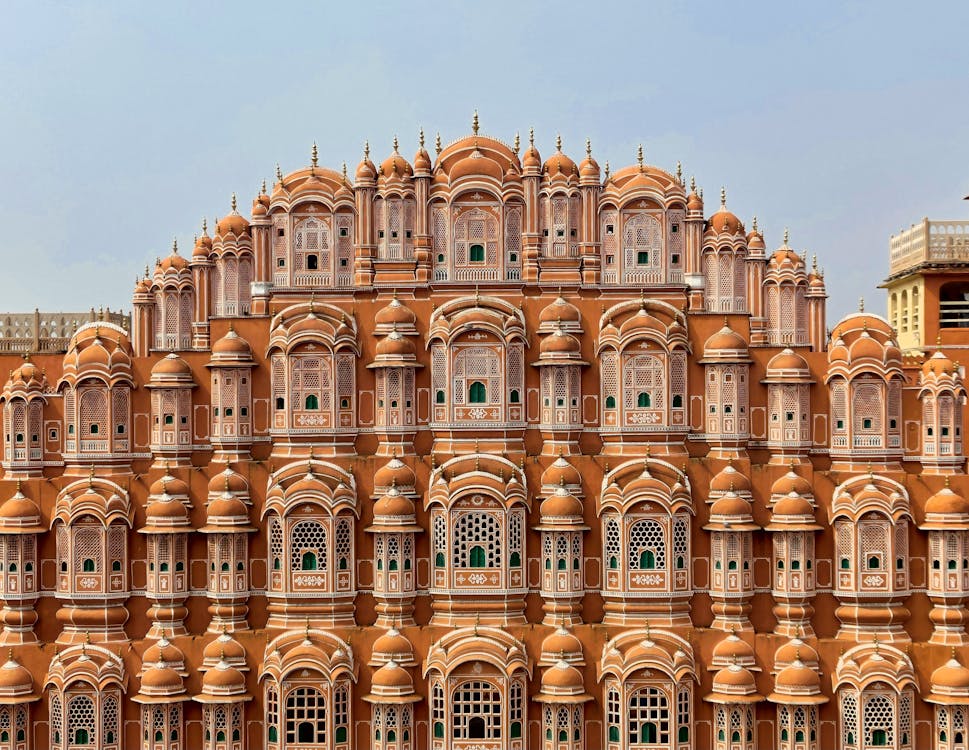 Private Jaipur Same Day Tour from Delhi by Car 5 Free Front view of Hawa Mahal, a stunning example of baroque architecture in Jaipur, India. Stock Photo