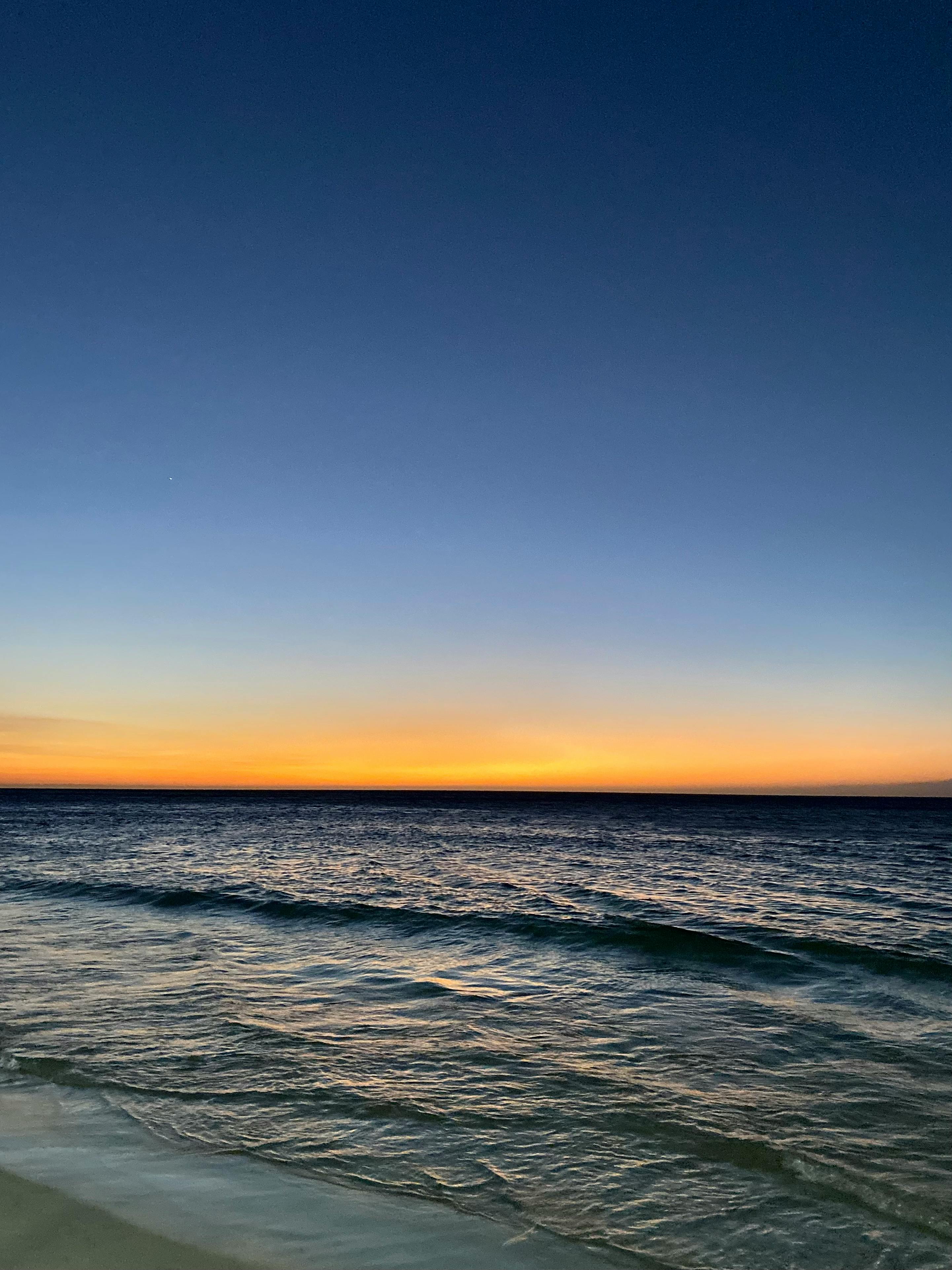 Tranquil sunset over the ocean at Santa Marta, Colombia. Perfect for travel inspiration.