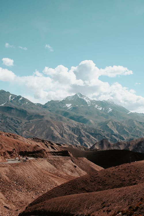 Mountain Ranges Under Clouds