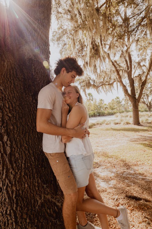 Free Woman Smiling While Leaning on the Man's Chest  Stock Photo