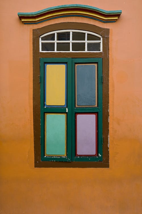 Foto profissional grátis de cheio de cor, construção, janela