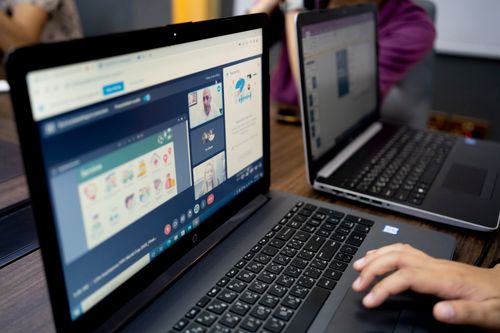 online dating brazil member messaging on laptop