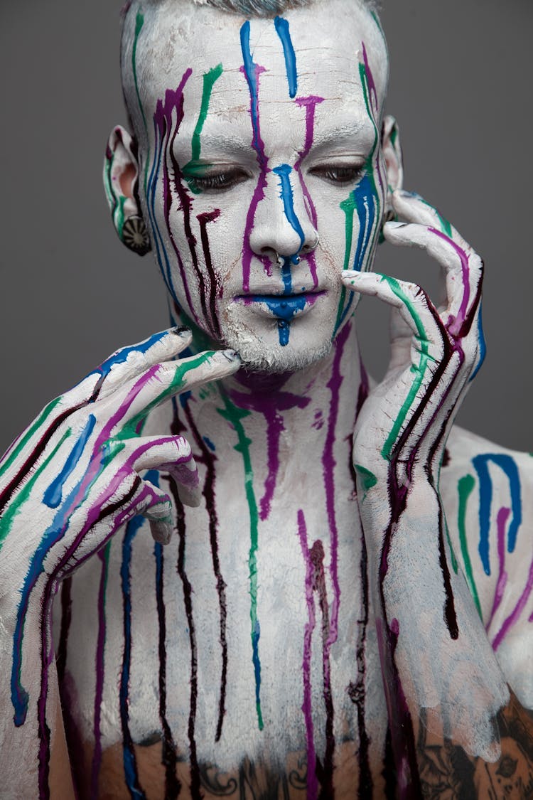 A Man With Paint On His Face