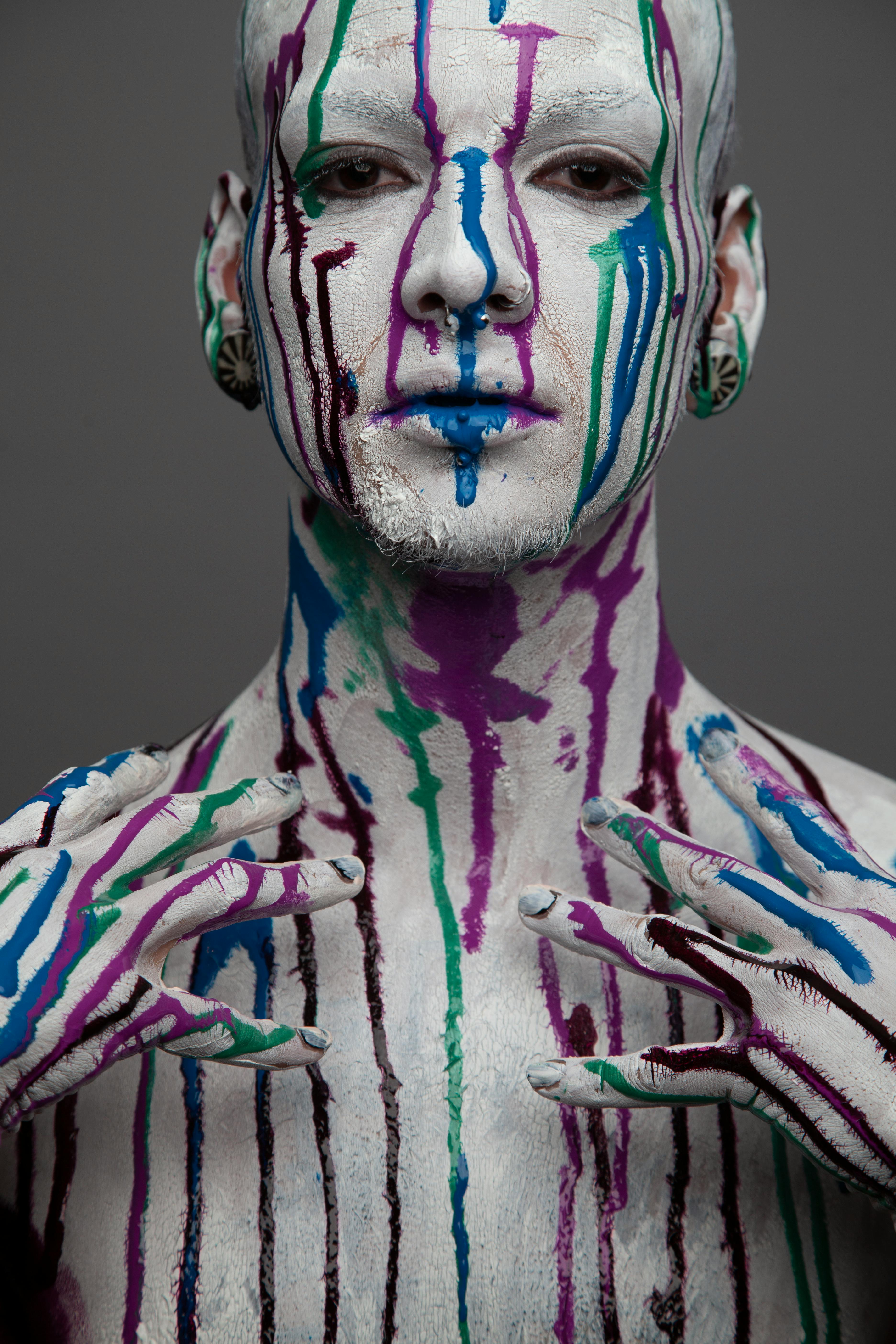 Portrait of Man with Colorful Paint on Face · Free Stock Photo