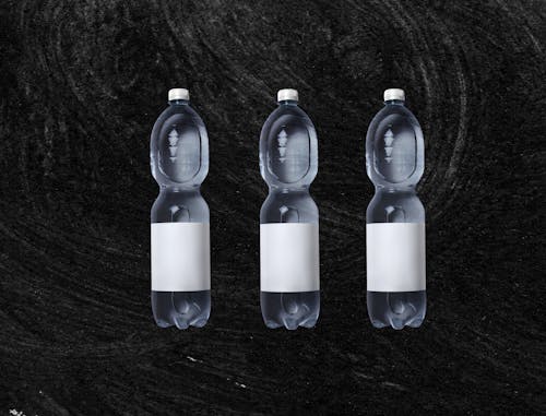 Set of plastic bottles with cold water