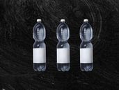 Set of plastic bottles with cold water