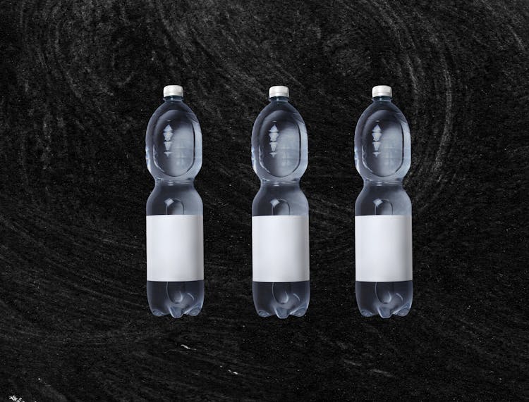 Set Of Plastic Bottles With Cold Water