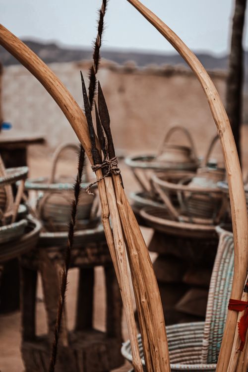 Free Rustic Angolan wicker baskets and tools in a rural setting, showcasing traditional craftsmanship. Stock Photo