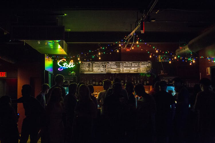 People Inside Bar At Nighttime