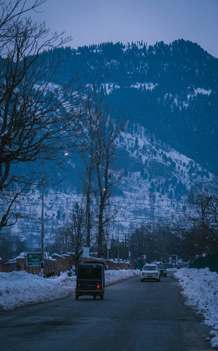 Vehicles On Road In Winter