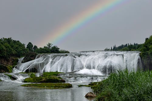 Photos gratuites de arc-en-ciel, cailloux, cascade