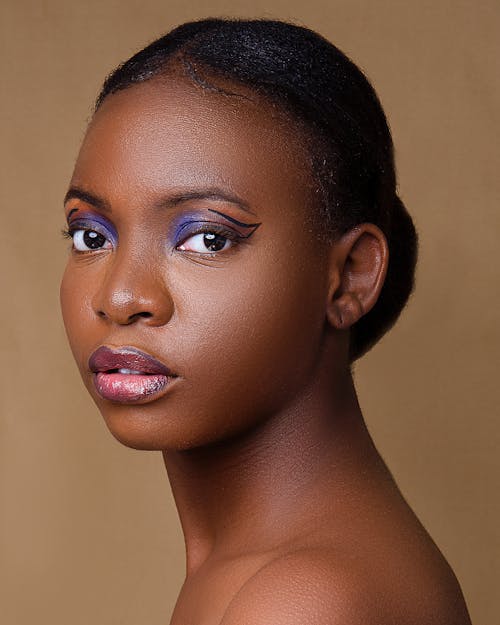 Studio Portrait of a Young Woman Wearing Makeup 