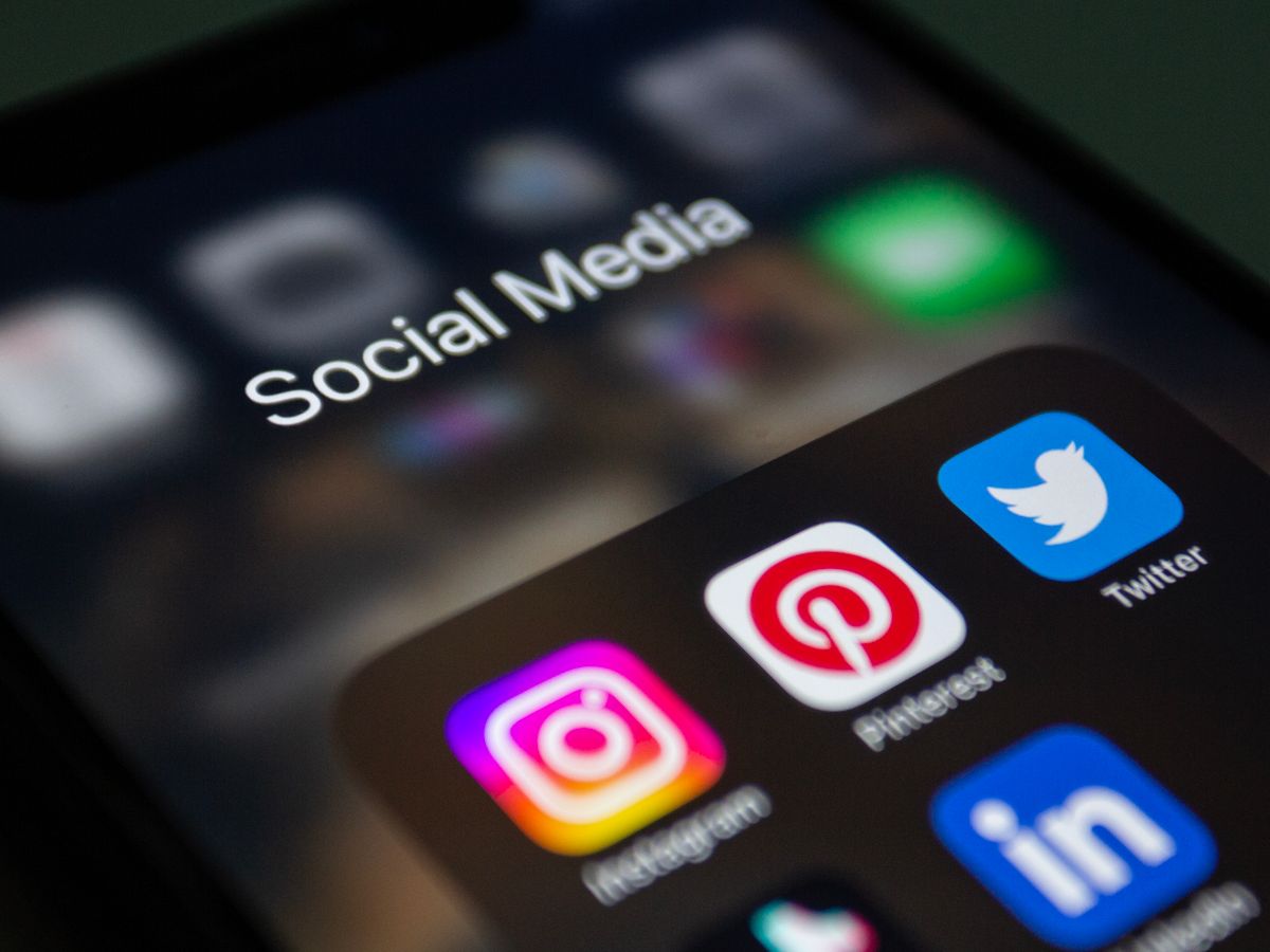 Smartphone home screen with social media apps