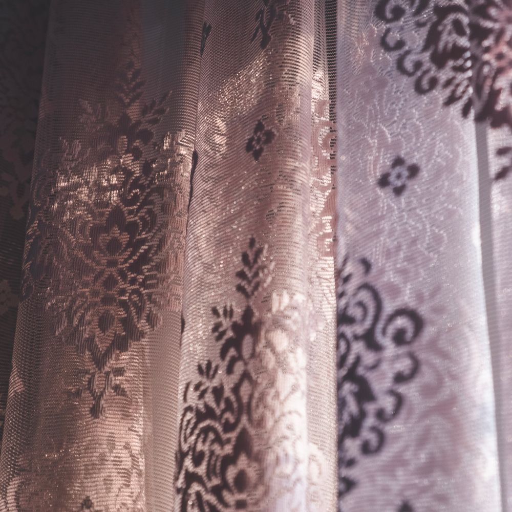 Wallpapering in Rush Green — woodwork brushed to a crisp, smooth line