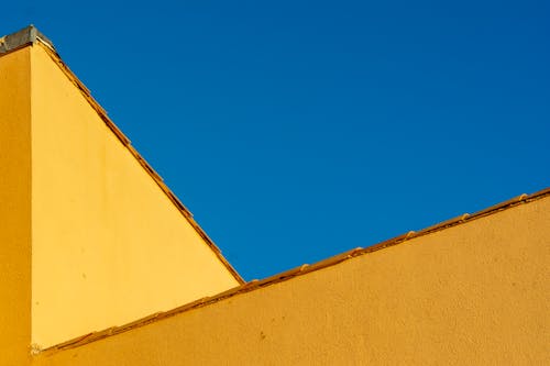 Ilmainen kuvapankkikuva tunnisteilla katto, keltainen, kuva alakulmasta