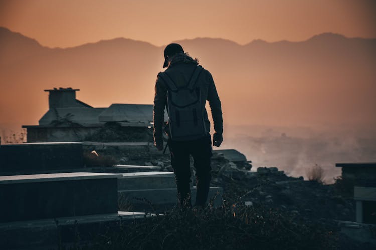 Man Standing On Building Ruins