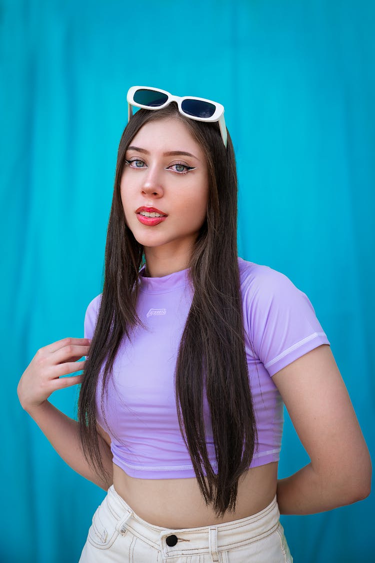 Brunette Posing With Sunglasses