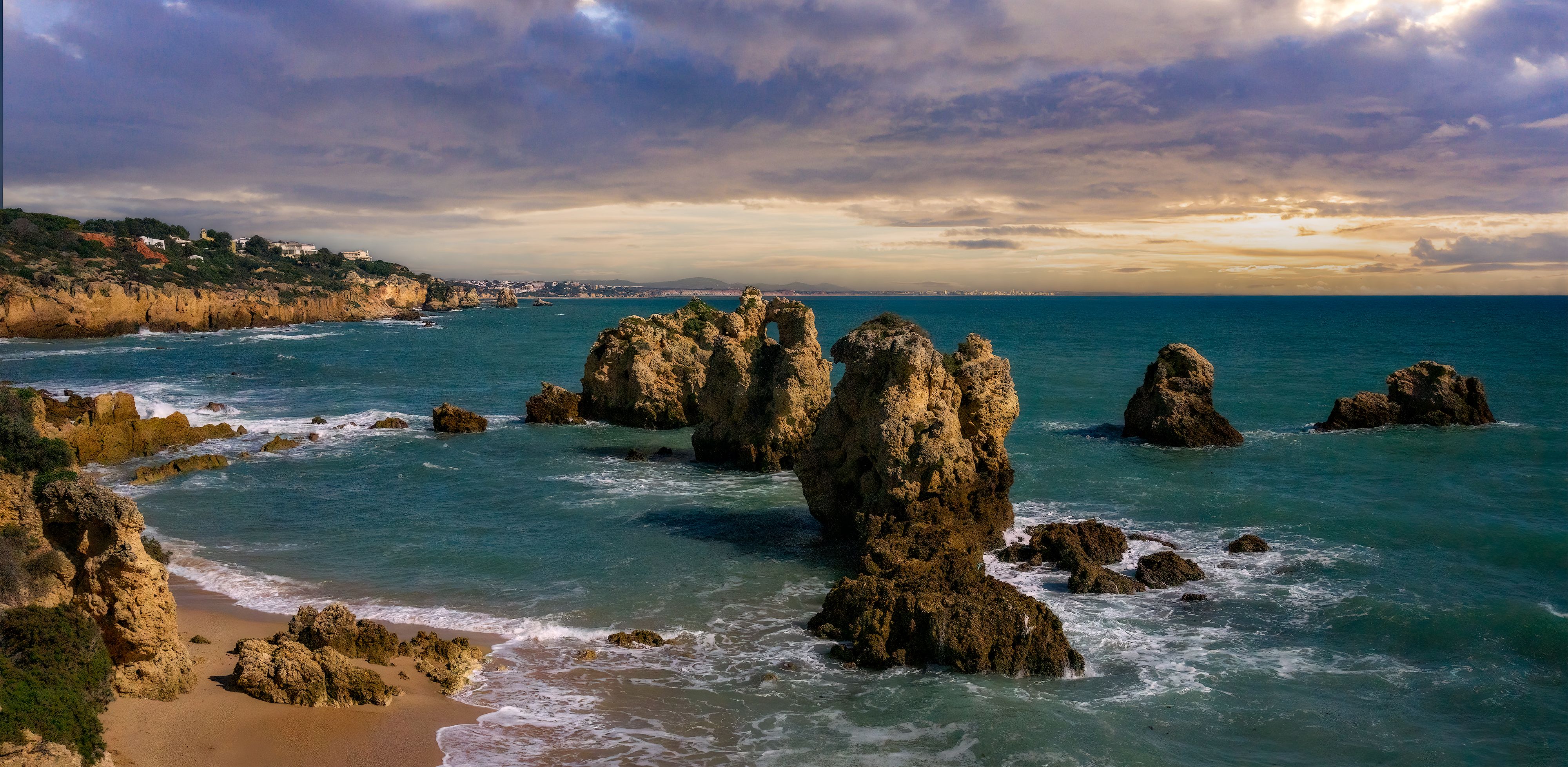 Rocks in Sea at Seashore on Sunset · Free Stock Photo
