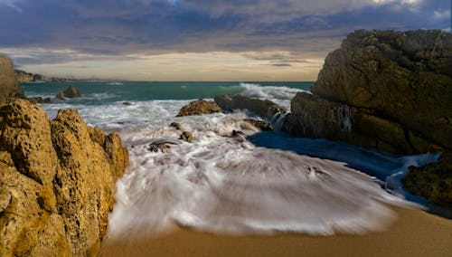 Бесплатное стоковое фото с закат, море, морской берег