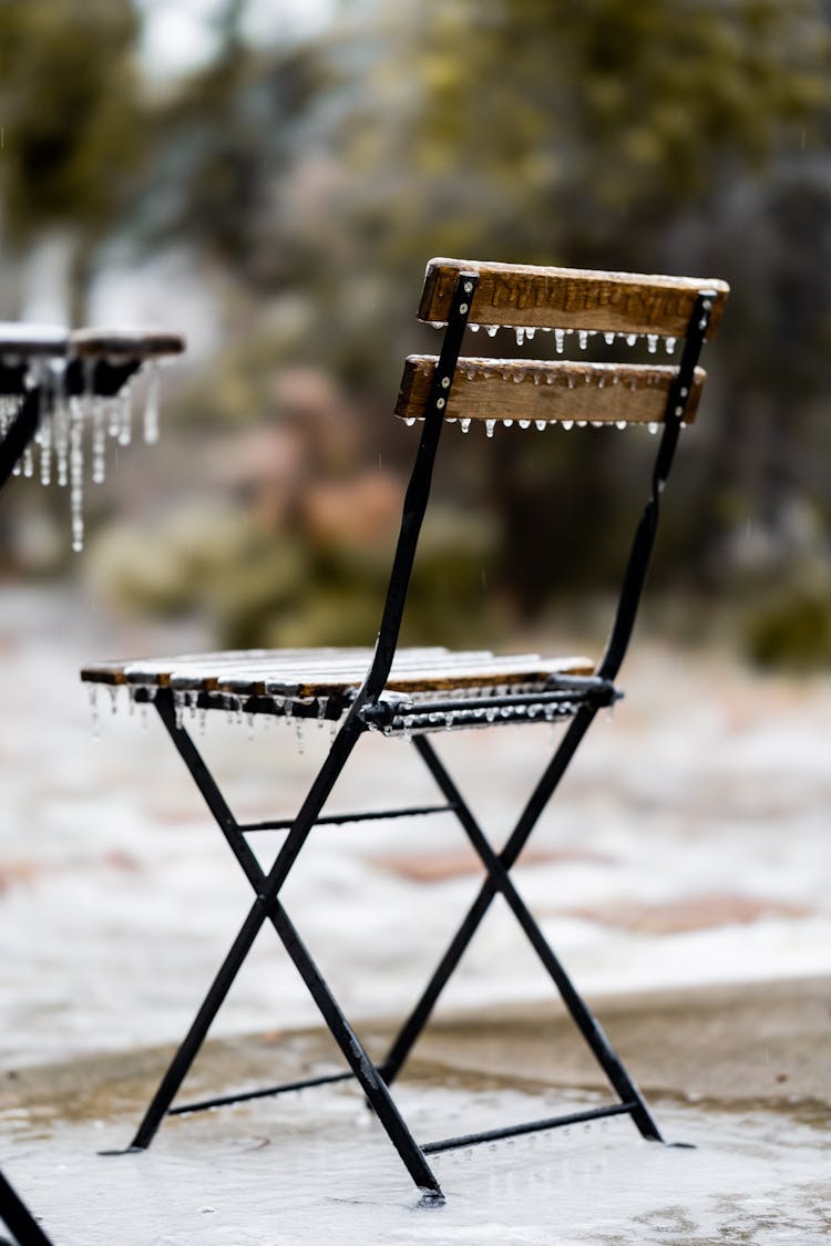 Chair In Frost And Icicles Outdoors