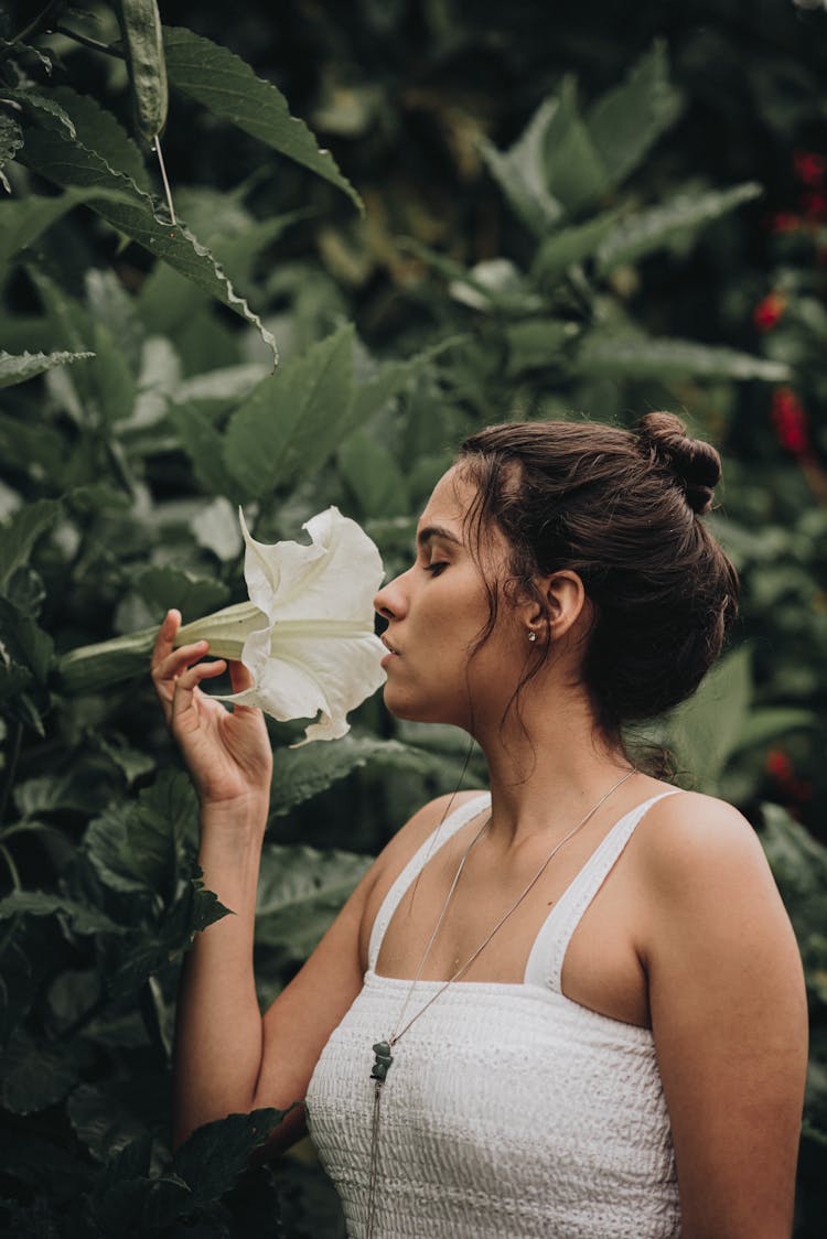 Woman Relaxing In Garden