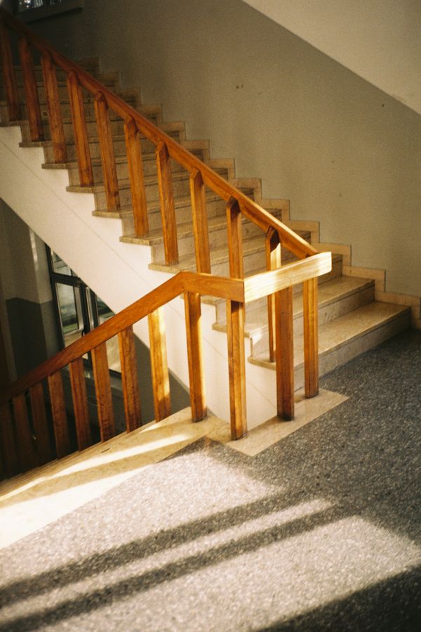 Wooden staircase with afternoon light, photo by Efe Ersoy on Pexels