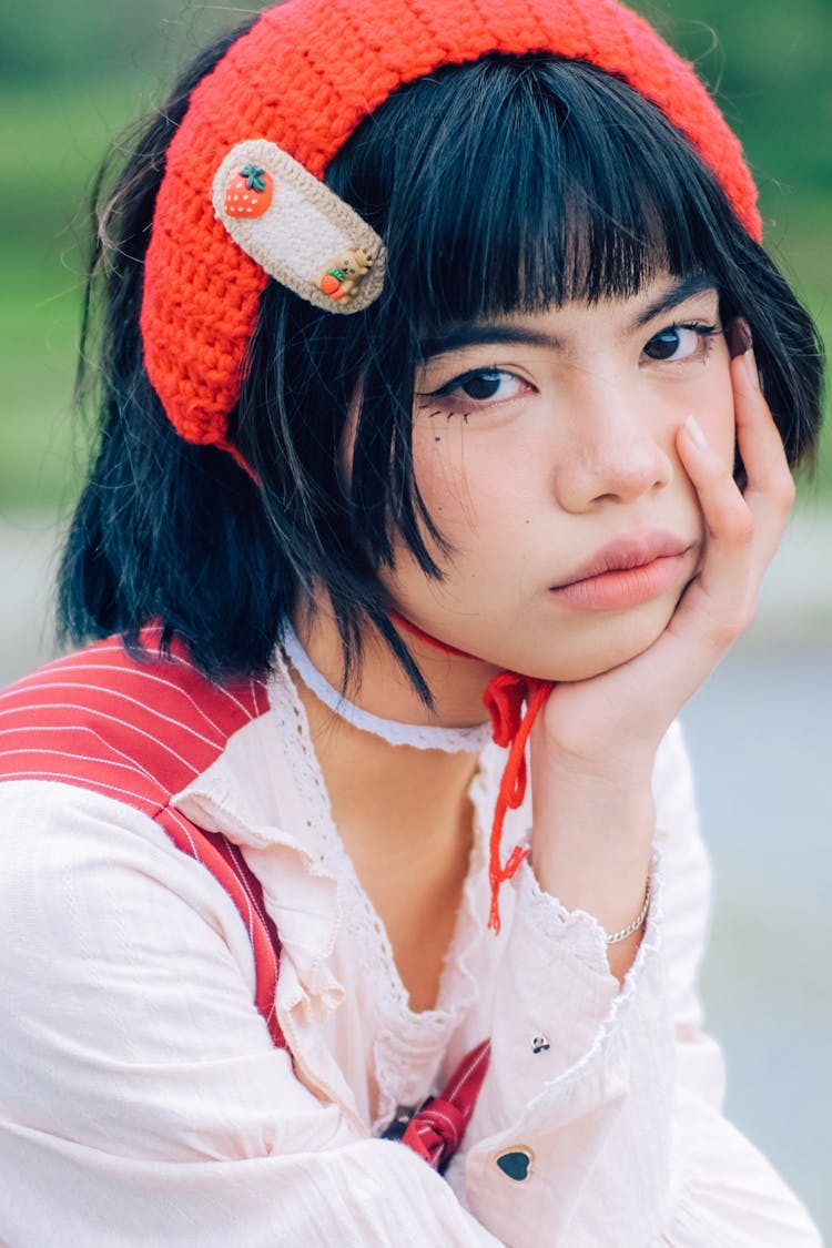 Portrait Of A Girl In A Red Dress And Headband 