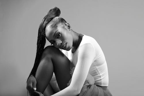 Woman with Ponytail Posing in Studio