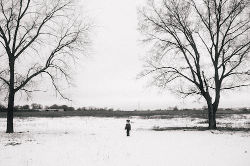 Boy Standing on Snow