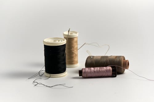 Colorful Threads on White Background
