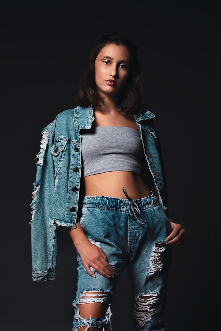 Girl Wearing Jeans And A Denim Jacket 