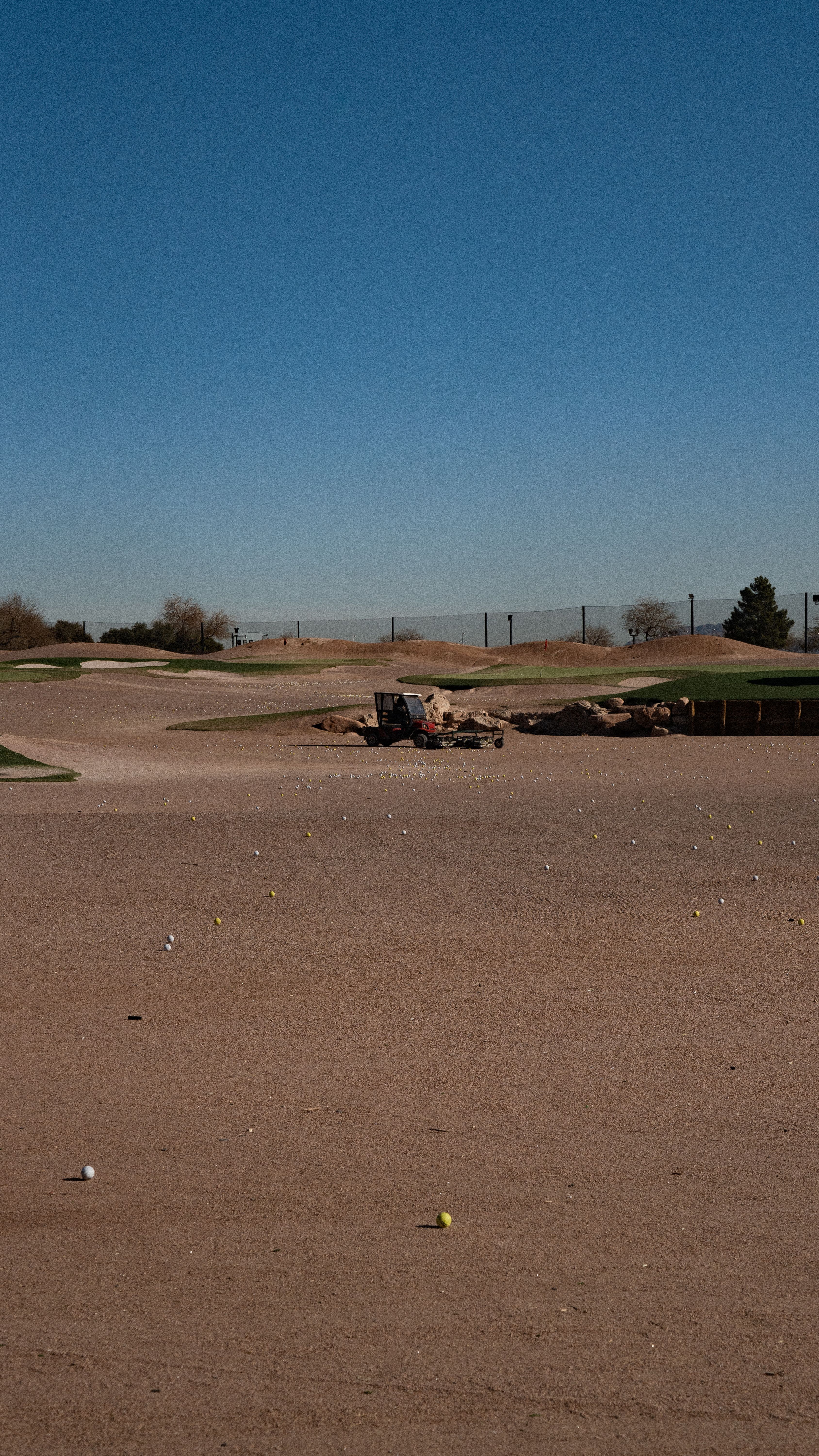 Green golf course fairway surrounded by desert terrain, the kind of recreation amenity that draws movers to Mesquite Nevada