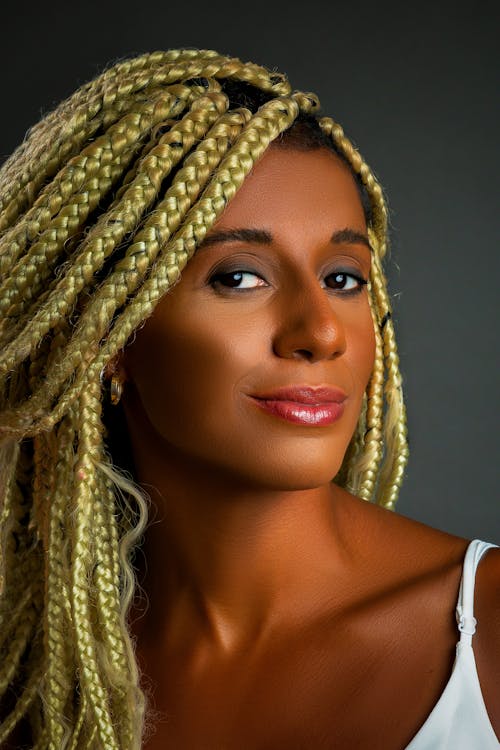 Portrait of a Beautiful Woman with Braided Hairstyle