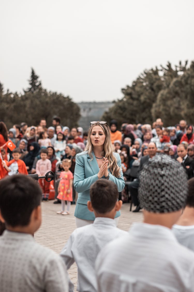 Young Woman Speaking To A Crowd