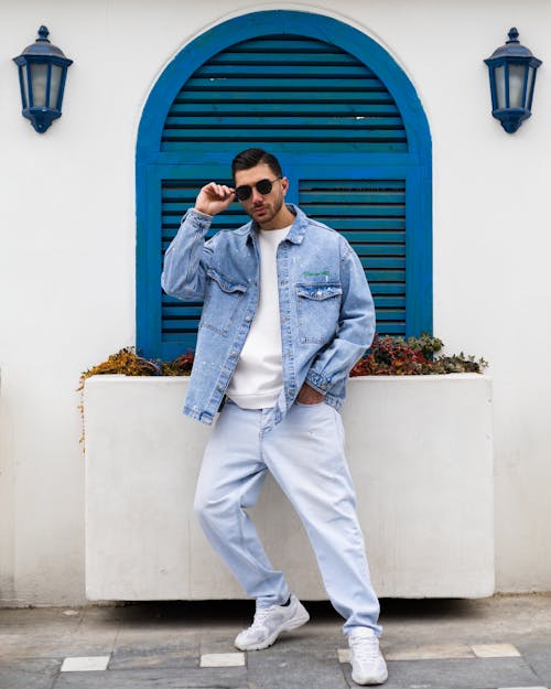 Man Wearing Denim Jacket on a Street 