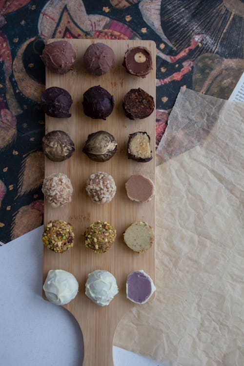 Homemade Chocolate Sweets on Wooden Board