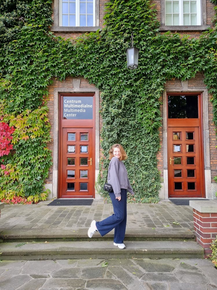 Woman Posing Outside A Building