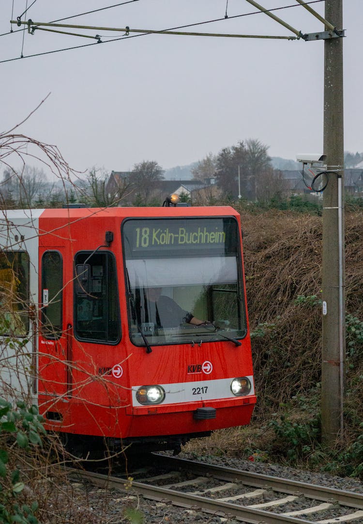 A Red Train On Railway Track