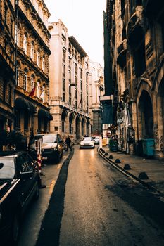 Explore the charm of Istanbul's historic streets, lined with vintage architecture at sunset.