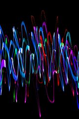 Cipher  -  overlapping neon sound waves on black background, dynamic digital abstraction for cyber identity