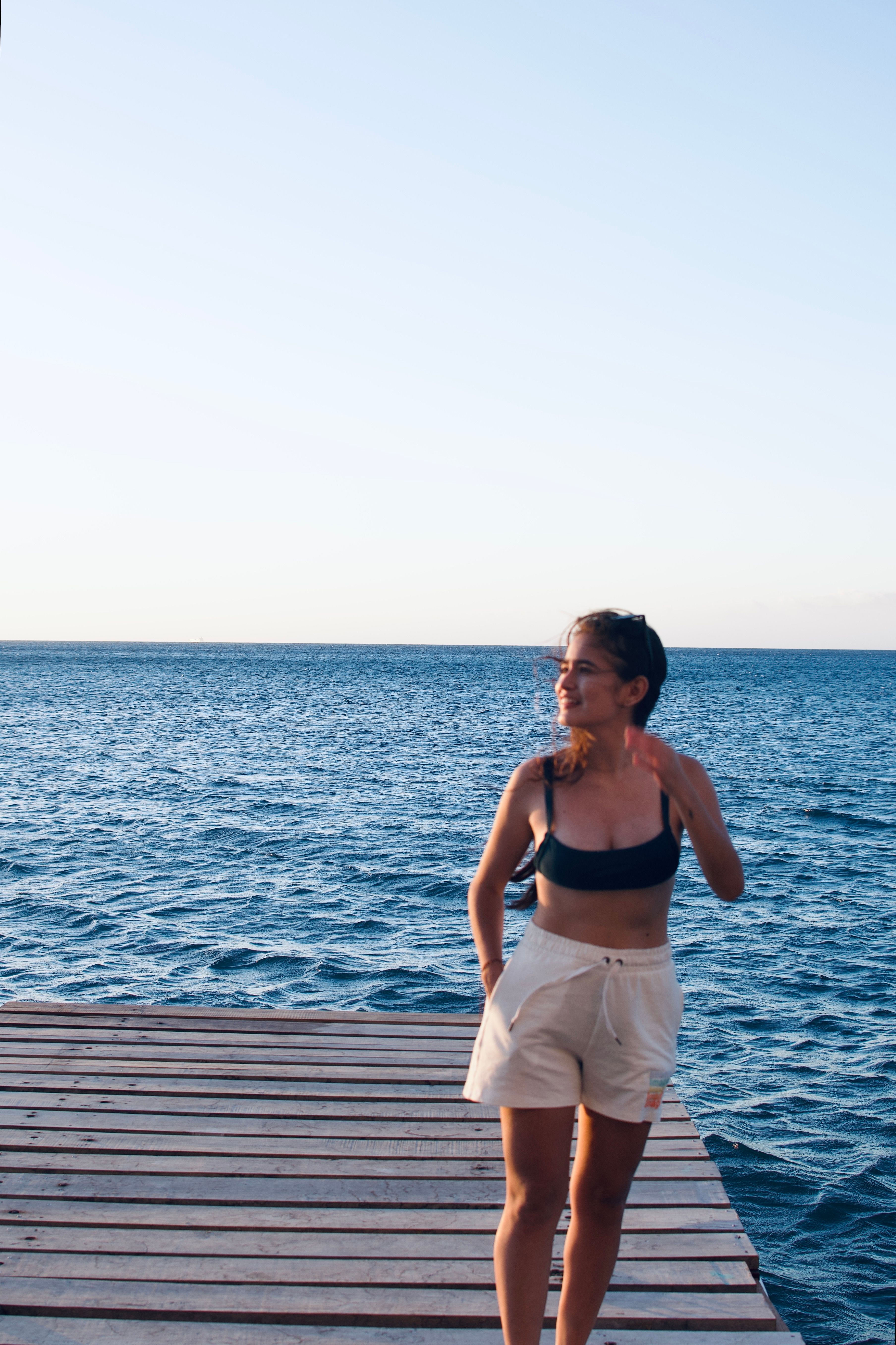 Woman in Swimsuit Posing at the Beach · Free Stock Photo